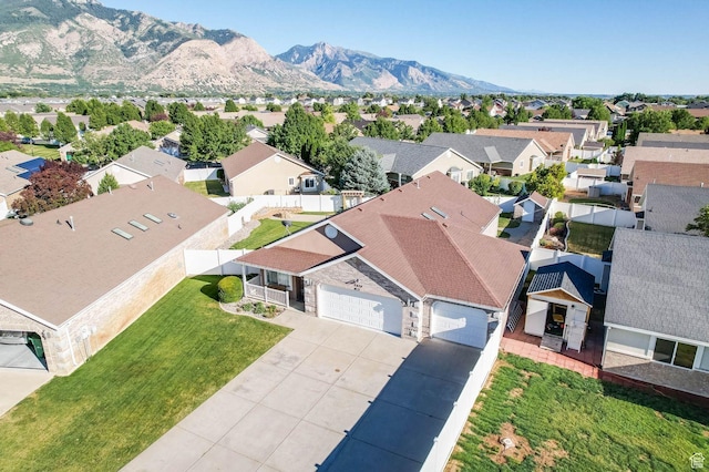 2474 N Dorchester Ave, Harrisville, UT 84414 - aerial view of residential area featuring a mountain backdrop