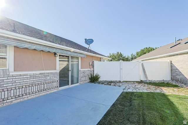 2474 N Dorchester Ave, Harrisville, UT 84414 - view of patio with a gate