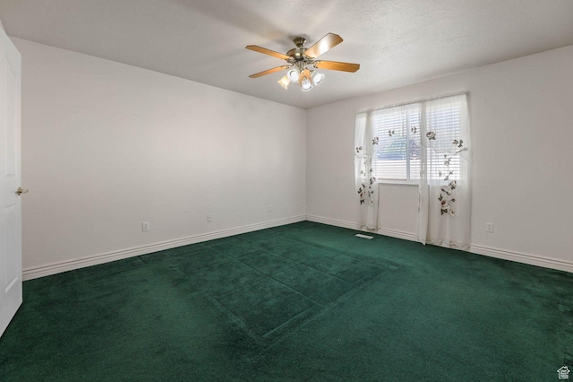 2474 N Dorchester Ave, Harrisville, UT 84414 - unfurnished room with a ceiling fan and carpet floors