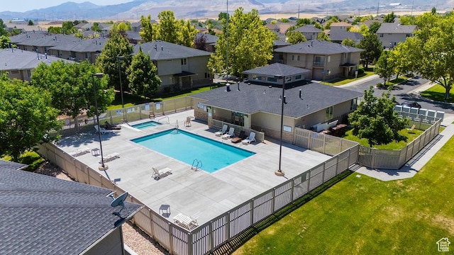 8457 S Ivy Springs Ln W, West Jordan, UT 84081 - community pool with a residential view, a mountain view, and a patio