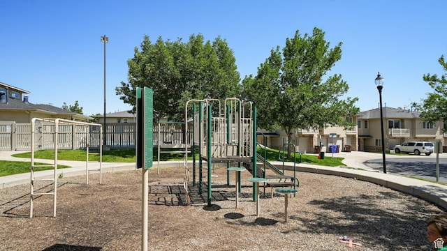 8457 S Ivy Springs Ln W, West Jordan, UT 84081 - community jungle gym with a residential view