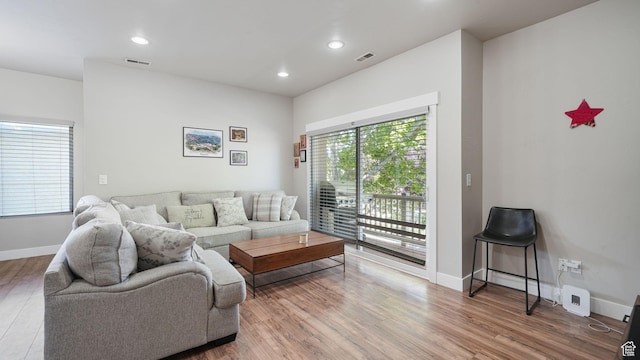 8457 S Ivy Springs Ln W, West Jordan, UT 84081 - living room featuring wood finished floors and recessed lighting