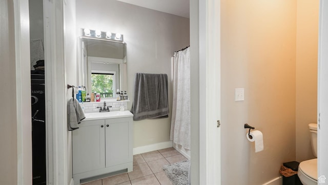 8457 S Ivy Springs Ln W, West Jordan, UT 84081 - bathroom featuring vanity, tile patterned flooring, tasteful backsplash, and a shower with shower curtain