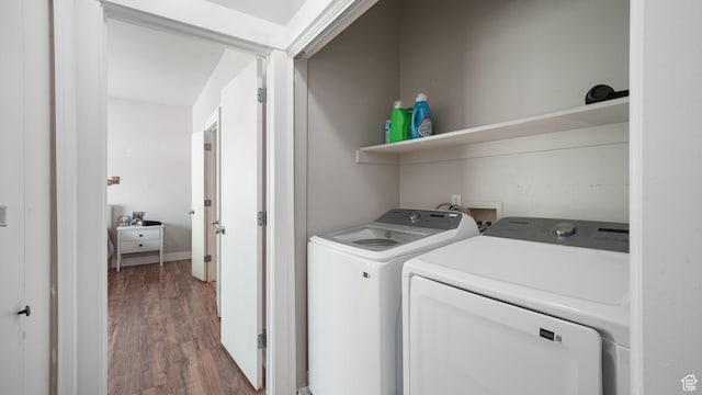 8457 S Ivy Springs Ln W, West Jordan, UT 84081 - washroom featuring washing machine and clothes dryer and wood finished floors