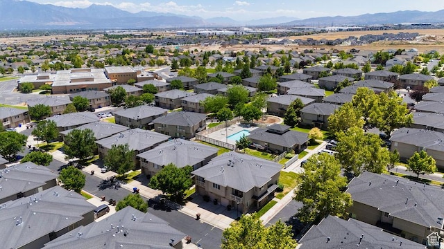 8457 S Ivy Springs Ln W, West Jordan, UT 84081 - aerial view of residential area with a mountain backdrop
