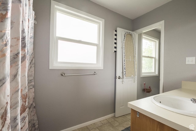 70 N 1100 W, Vernal, UT 84078 - full bath with vanity and stone finish flooring