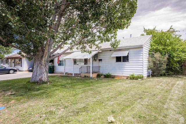 70 N 1100 W, Vernal, UT 84078 - single story home with a front yard and roof with shingles