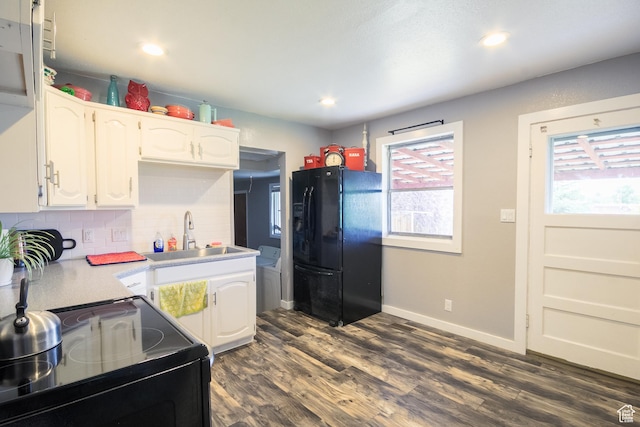 70 N 1100 W, Vernal, UT 84078 - kitchen featuring black appliances, white cabinets, dark wood-type flooring, decorative backsplash, and light countertops
