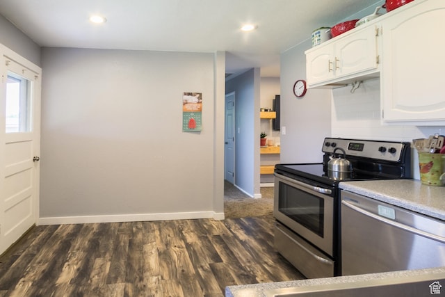 70 N 1100 W, Vernal, UT 84078 - kitchen featuring stainless steel appliances, white cabinetry, light countertops, dark wood-type flooring, and recessed lighting