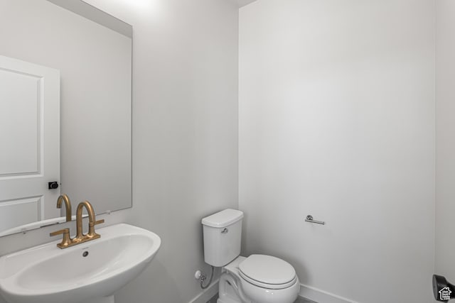 11184 S Easy Bee Rd Unit 265, South Jordan, UT 84009 - half bath with a sink and baseboards