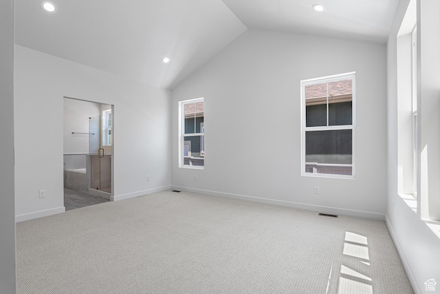 11184 S Easy Bee Rd Unit 265, South Jordan, UT 84009 - unfurnished bedroom featuring vaulted ceiling, carpet, recessed lighting, and ensuite bath