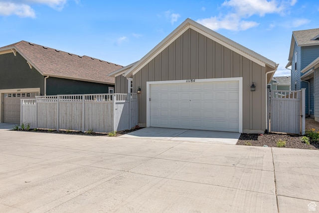 11184 S Easy Bee Rd Unit 265, South Jordan, UT 84009 - single story home with board and batten siding, concrete driveway, and a gate