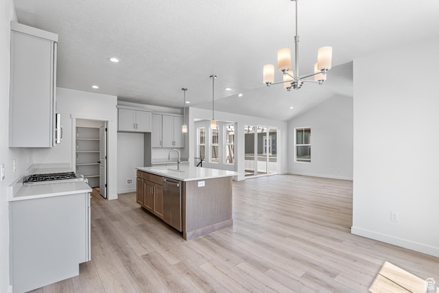 11184 S Easy Bee Rd Unit 265, South Jordan, UT 84009 - kitchen featuring appliances with stainless steel finishes, recessed lighting, light wood-style floors, a chandelier, and light countertops
