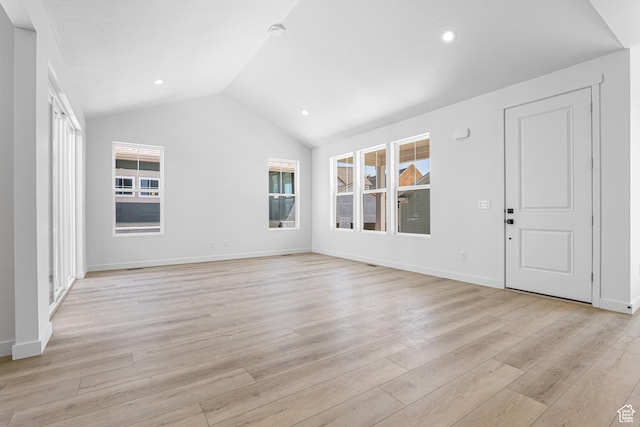 11184 S Easy Bee Rd Unit 265, South Jordan, UT 84009 - unfurnished living room featuring light wood-style floors, lofted ceiling, and recessed lighting