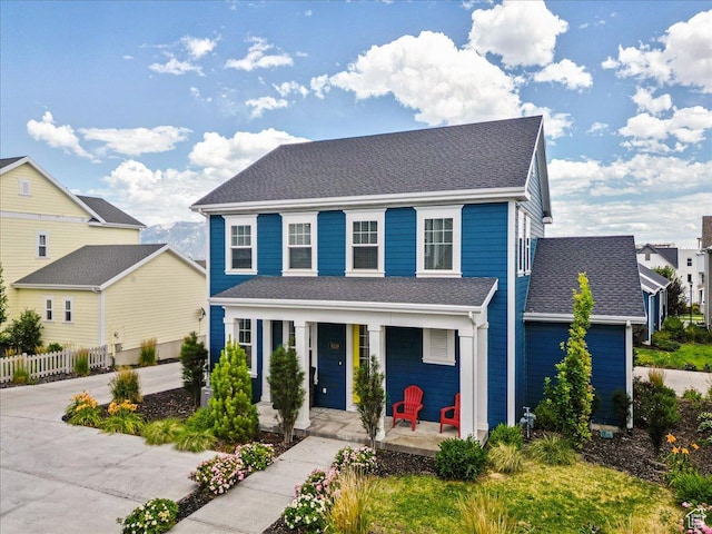 5239 W Mellow Way S, Jordan, UT 84009 - colonial house with a porch and a shingled roof