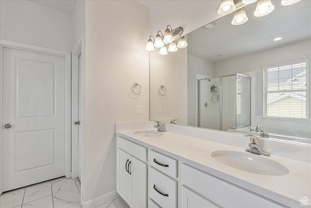 5239 W Mellow Way S, Jordan, UT 84009 - bathroom with marble finish flooring, a stall shower, double vanity, and a bath