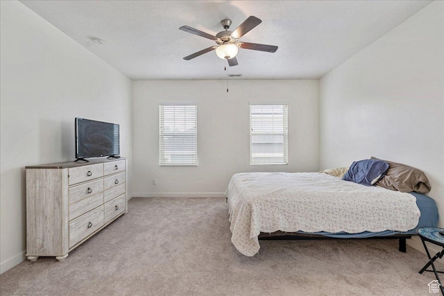 5239 W Mellow Way S, Jordan, UT 84009 - bedroom with light carpet and a ceiling fan