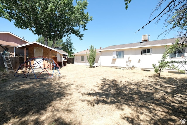 4217 W Twilight Dr S, Salt Lake City, UT 84118 - back of property with a wall mounted AC