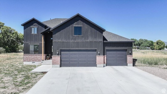 165 N 300 W, Preston, ID 83263 - modern inspired farmhouse with brick siding, board and batten siding, driveway, and roof with shingles