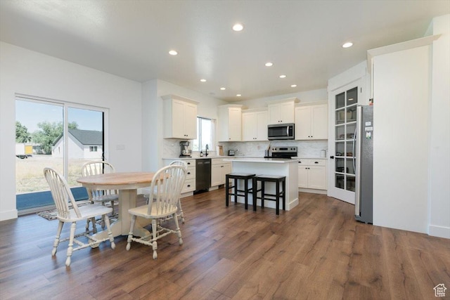 165 N 300 W, Preston, ID 83263 - dining room with dark wood-style flooring and recessed lighting