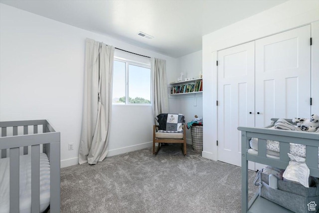 165 N 300 W, Preston, ID 83263 - bedroom featuring carpet floors, a nursery area, and a closet