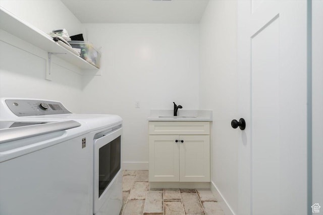 165 N 300 W, Preston, ID 83263 - laundry room with washing machine and dryer and cabinet space