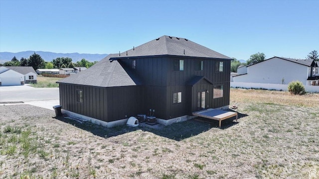 165 N 300 W, Preston, ID 83263 - back of house featuring board and batten siding, a shingled roof, and a mountain view