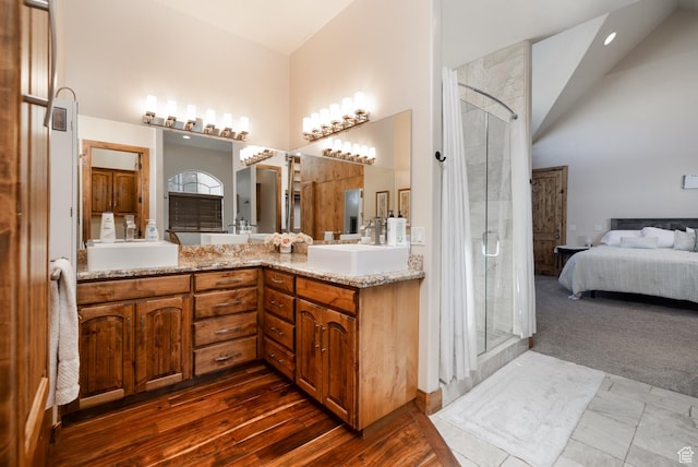 2849 W 1800 S, Vernal, UT 84078 - bathroom with a stall shower, double vanity, high vaulted ceiling, and ensuite bath
