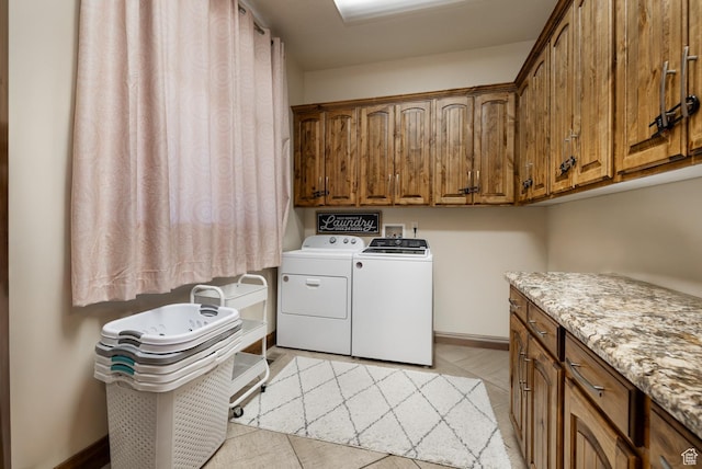 2849 W 1800 S, Vernal, UT 84078 - laundry room featuring cabinet space, washer and clothes dryer, and light tile patterned floors