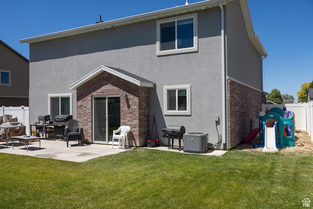 122 N 1325 W, Springville, UT 84663 - back of house with brick siding, a patio area, a fenced backyard, and stucco siding