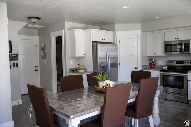 122 N 1325 W, Springville, UT 84663 - dining room with a textured ceiling, dark wood-style floors, and recessed lighting