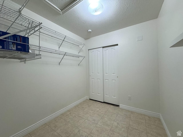 94 Hillsborough Dr, Pleasant View, UT 84414 - spacious closet featuring tile patterned floors