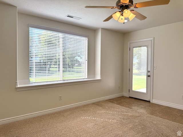 94 Hillsborough Dr, Pleasant View, UT 84414 - unfurnished room featuring a ceiling fan and carpet floors