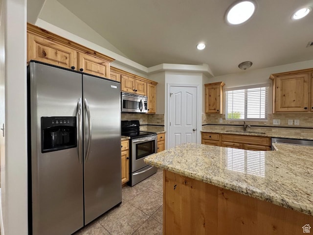 94 Hillsborough Dr, Pleasant View, UT 84414 - kitchen featuring stainless steel appliances, decorative backsplash, light stone counters, light tile patterned flooring, and recessed lighting