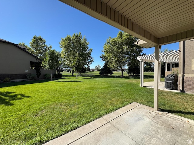 94 Hillsborough Dr, Pleasant View, UT 84414 - view of grassy yard featuring a pergola and a patio