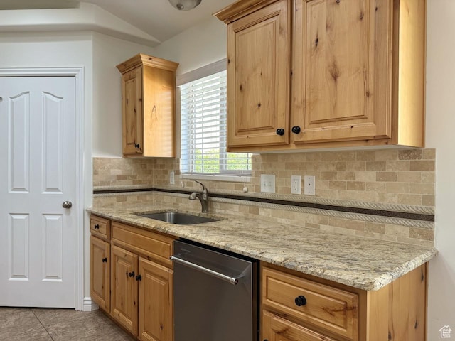 94 Hillsborough Dr, Pleasant View, UT 84414 - kitchen with stainless steel dishwasher, backsplash, light stone counters, and light tile patterned floors