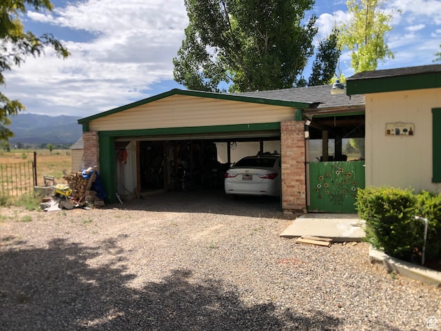 15700 N 7100 E, Spring City, UT 84662 - garage featuring driveway and a mountain view