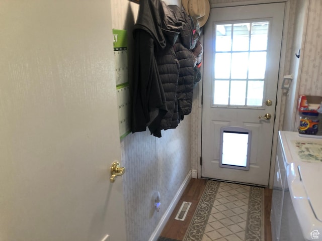 15700 N 7100 E, Spring City, UT 84662 - doorway featuring washer and clothes dryer and wood finished floors