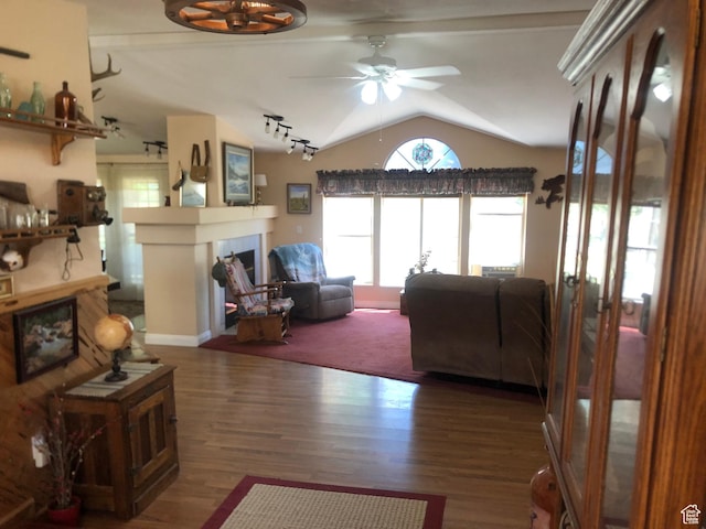 15700 N 7100 E, Spring City, UT 84662 - living room featuring vaulted ceiling, ceiling fan, wood finished floors, and a fireplace