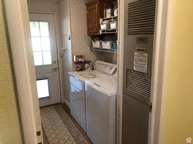 15700 N 7100 E, Spring City, UT 84662 - washroom with a heating unit, washing machine and clothes dryer, cabinet space, and wallpapered walls