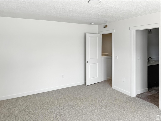 8239 W Joshua Tree Ln, Magna, UT 84044 - unfurnished bedroom with carpet flooring and a textured ceiling