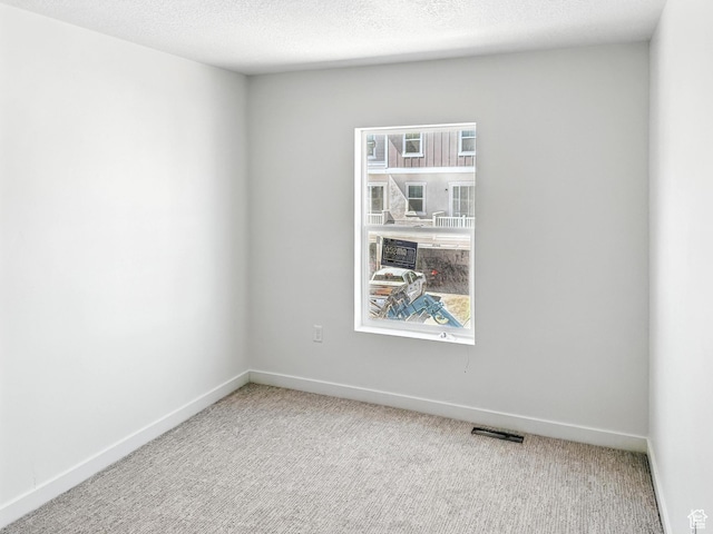 8239 W Joshua Tree Ln, Magna, UT 84044 - carpeted empty room featuring baseboards