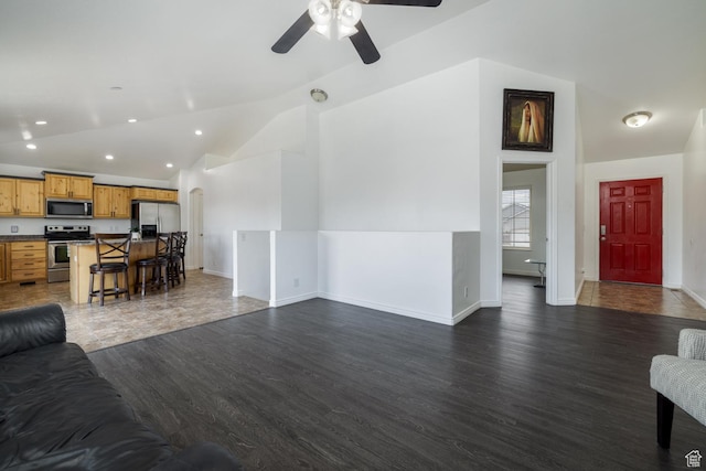 392 E 2900 S, Vernal, UT 84078 - living room with vaulted ceiling, a ceiling fan, dark wood-style flooring, and recessed lighting