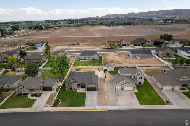 392 E 2900 S, Vernal, UT 84078 - aerial perspective of suburban area featuring property parcel outlined and a mountain backdrop