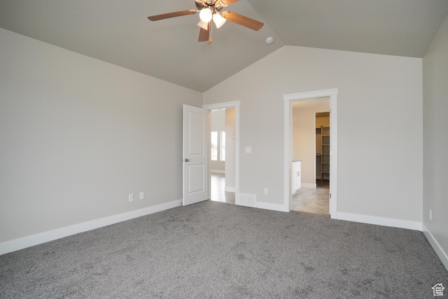 3045 S 2275 W, West Haven, UT 84401 - unfurnished bedroom with vaulted ceiling, a walk in closet, carpet floors, and a ceiling fan