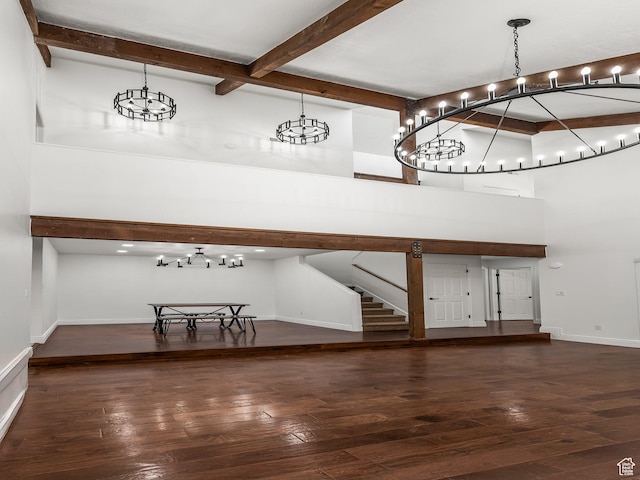 3818 N Little Rock Ct E, Provo, UT 84604 - unfurnished dining area featuring beamed ceiling, hardwood / wood-style floors, a high ceiling, a chandelier, and stairs
