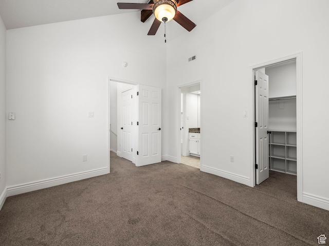 3818 N Little Rock Ct E, Provo, UT 84604 - unfurnished bedroom with high vaulted ceiling, a spacious closet, carpet floors, ensuite bath, and a ceiling fan