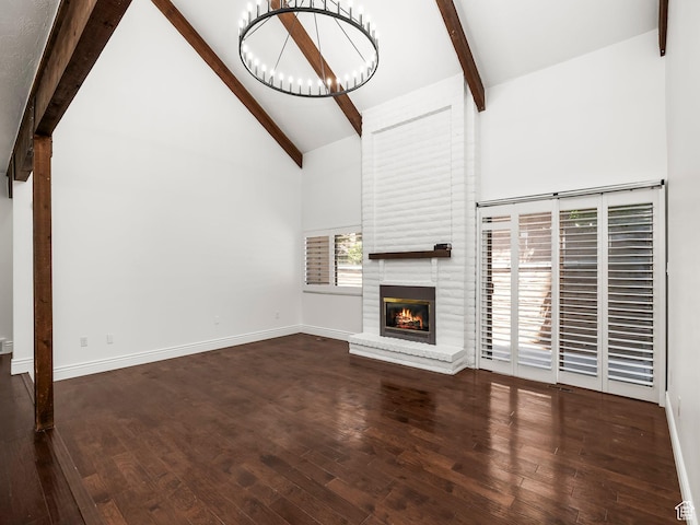3818 N Little Rock Ct E, Provo, UT 84604 - unfurnished living room with beam ceiling, a fireplace, high vaulted ceiling, a chandelier, and wood finished floors