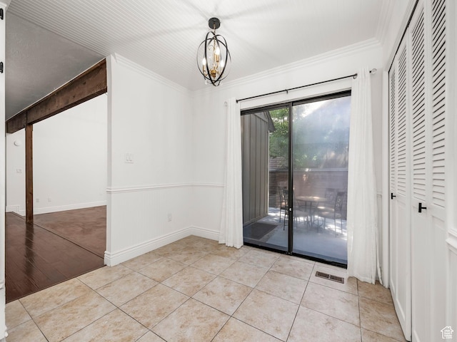 3818 N Little Rock Ct E, Provo, UT 84604 - unfurnished dining area with crown molding, a chandelier, and tile patterned flooring