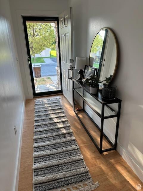 12228 S Madison View Dr, Riverton, UT 84065 - doorway to outside featuring baseboards and wood finished floors